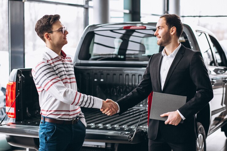 man buying car